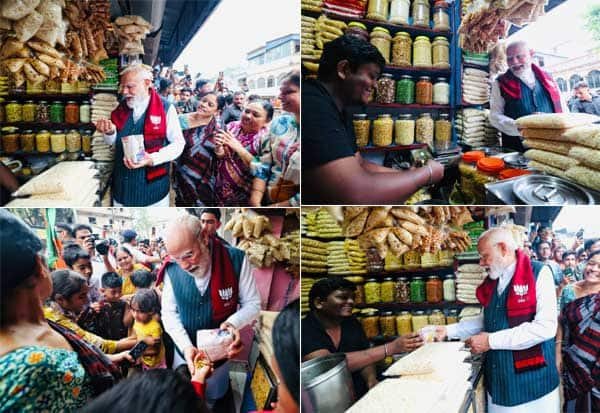 மே.வங்க பிரசாரத்தில் சாலையோர கடையில் ஜல்முரி வாங்கி ருசித்த பிரதமர் மோடி