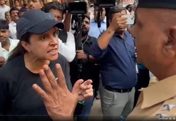 பா.ஜ.க போராட்டம் ஏற்படுத்திய டிராபிக் ஜாம்: அமைச்சர் கிரிஷ் மஹாஜனுடன் பெண் வாக்குவாதம்