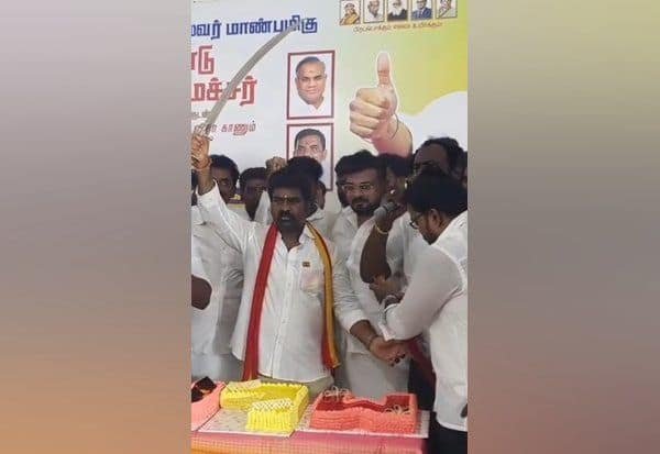 Rayapuram MLA Vijay Thamu draws flak for cutting cake with a sword