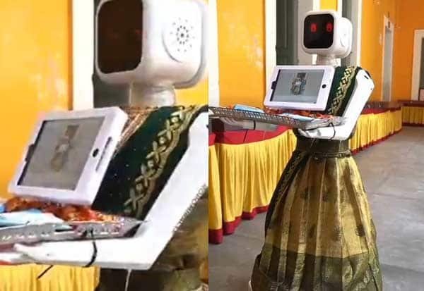 Robot ‘Nila’ welcomes voters with roses at Puducherry polling booth